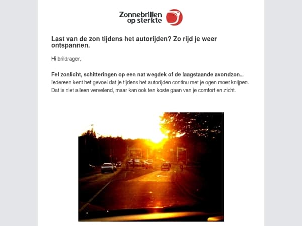 Brildrager, nat wegdek, zon erdoorheen, en je ziet niets meer